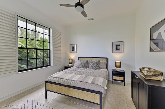 bedroom featuring ceiling fan and light tile patterned floors