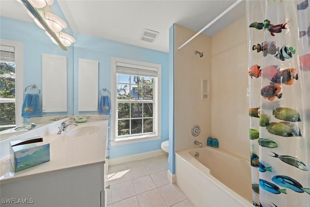 full bath featuring visible vents, toilet, shower / tub combo, vanity, and tile patterned floors