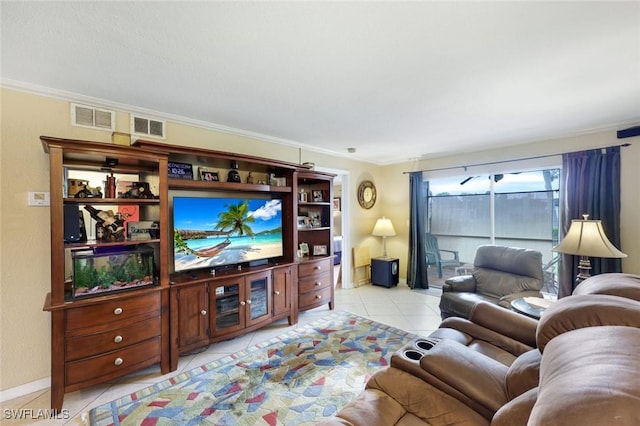 living room featuring light tile patterned floors, ornamental molding, and visible vents