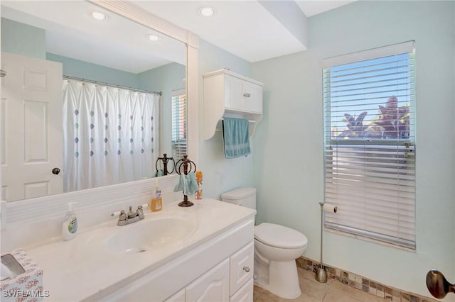 bathroom with vanity, recessed lighting, curtained shower, tile patterned floors, and toilet