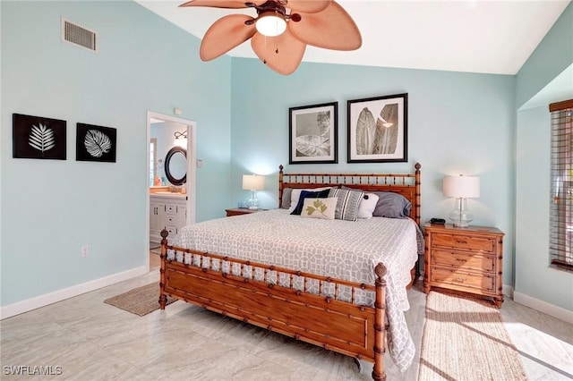 bedroom with visible vents, lofted ceiling, and baseboards