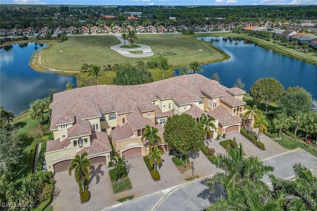 birds eye view of property featuring a water view