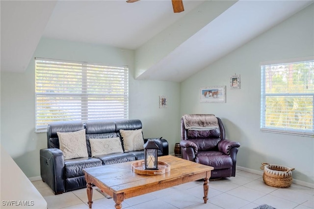 living room featuring ceiling fan, vaulted ceiling, and a healthy amount of sunlight