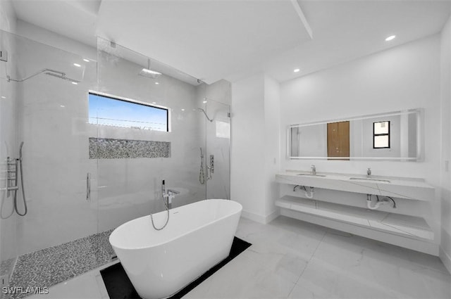 bathroom featuring vanity and plus walk in shower