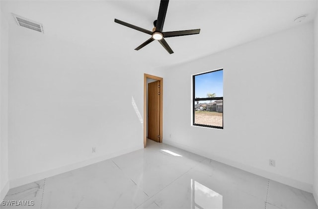 unfurnished room with ceiling fan