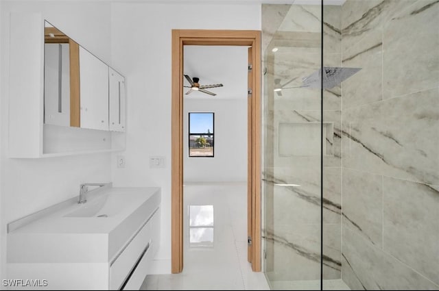 bathroom featuring vanity and a tile shower