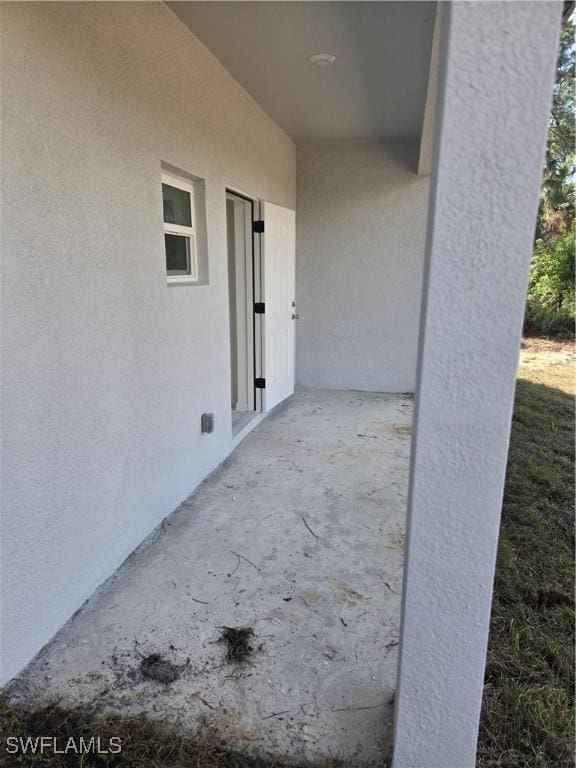 exterior space with stucco siding