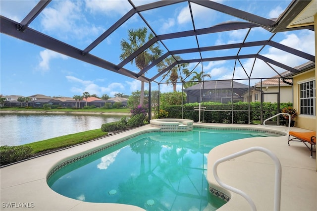 view of pool with a water view, an in ground hot tub, a patio area, and glass enclosure