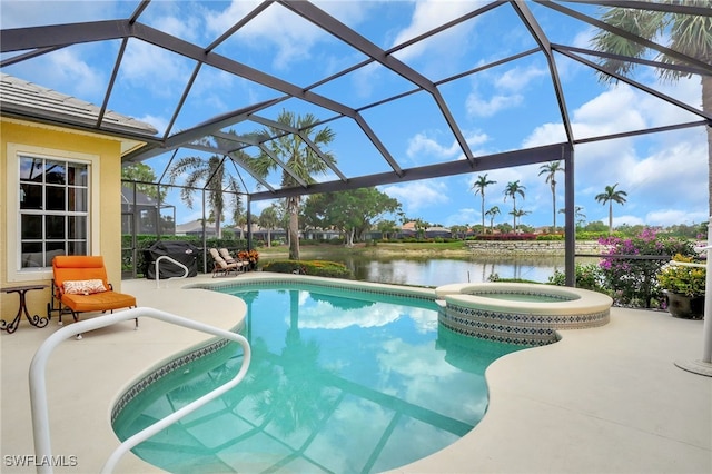 view of pool featuring an in ground hot tub, a water view, glass enclosure, and a patio area