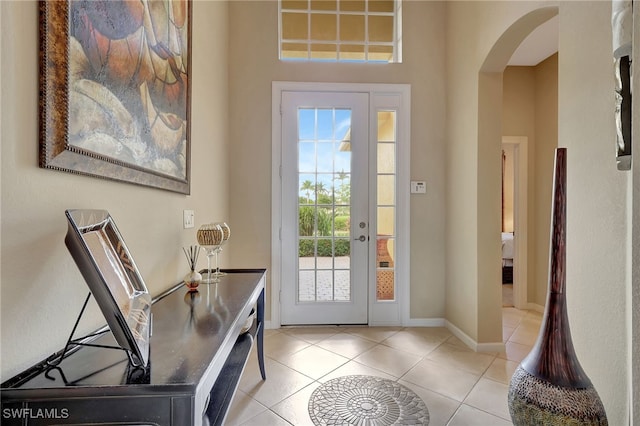 doorway featuring light tile patterned floors