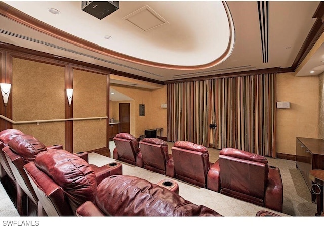 carpeted cinema with crown molding