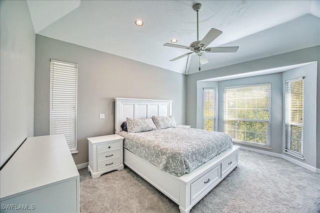 bedroom with light colored carpet and ceiling fan