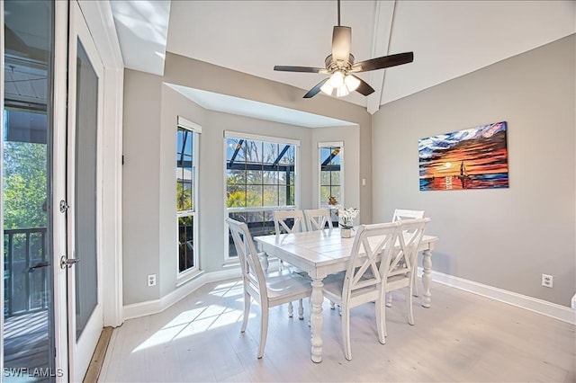 dining space featuring ceiling fan and light hardwood / wood-style flooring