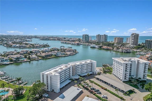 birds eye view of property featuring a water view