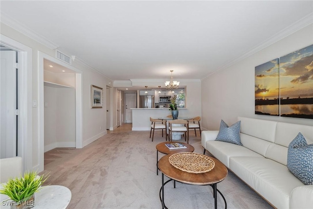 carpeted living room with crown molding and an inviting chandelier