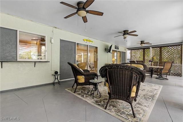 view of patio featuring outdoor lounge area and ceiling fan