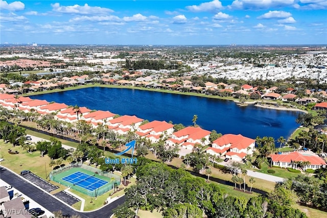 bird's eye view featuring a residential view and a water view