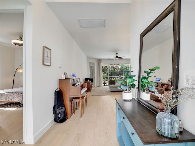 8850 Springwood Ct, Bonita Springs, FL 34135 - hall with baseboards, light wood-style floors, and visible vents