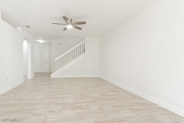 empty room featuring ceiling fan