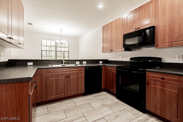 kitchen featuring pendant lighting, sink, an inviting chandelier, black appliances, and kitchen peninsula