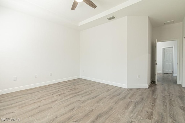 unfurnished room with ceiling fan and light hardwood / wood-style floors