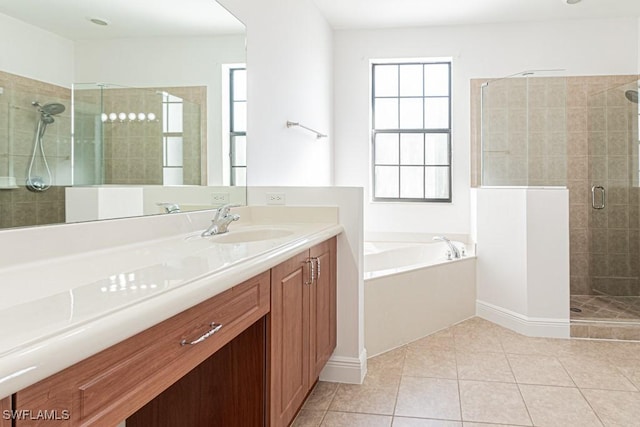 bathroom featuring tile patterned flooring, vanity, and plus walk in shower