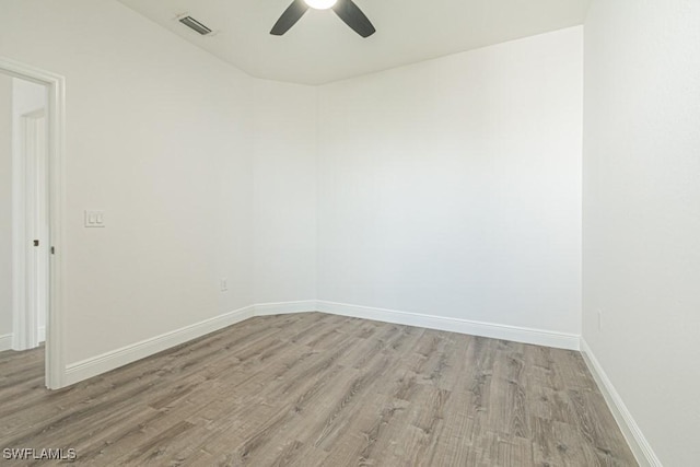 unfurnished room with ceiling fan and light hardwood / wood-style floors