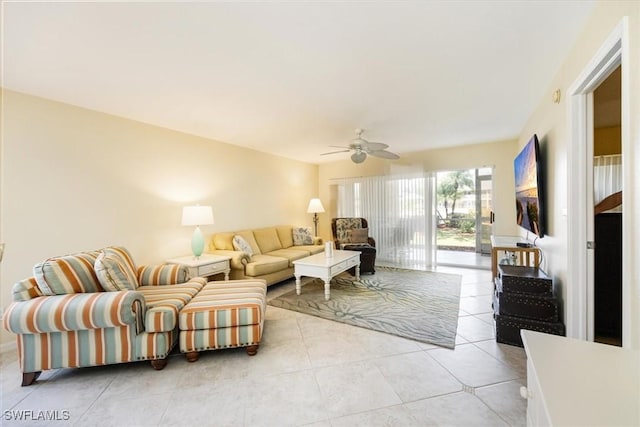 living room with light tile patterned floors and ceiling fan