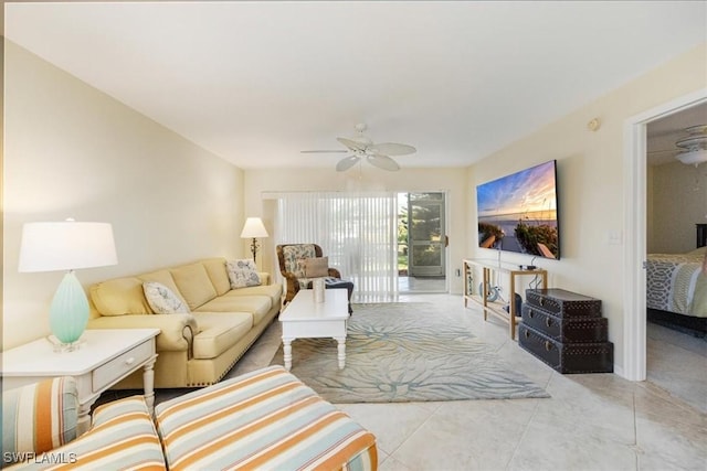 living area featuring ceiling fan