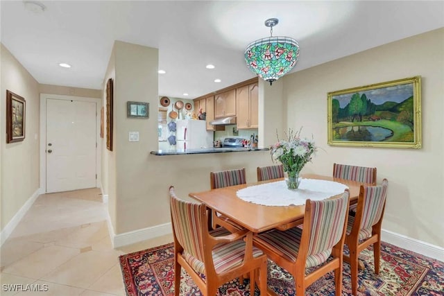 5595 Rattlesnake Hammock Rd Unit C-19, Naples, FL 34113 - dining room with recessed lighting and light tile patterned floors