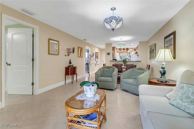 5595 Rattlesnake Hammock Rd Unit C-19, Naples, FL 34113 - living area featuring light tile patterned floors