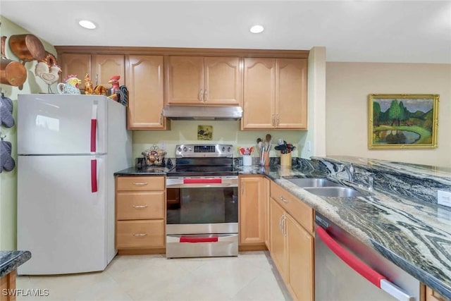 5595 Rattlesnake Hammock Rd Unit C-19, Naples, FL 34113 - kitchen featuring appliances with stainless steel finishes, under cabinet range hood, recessed lighting, and dark stone countertops