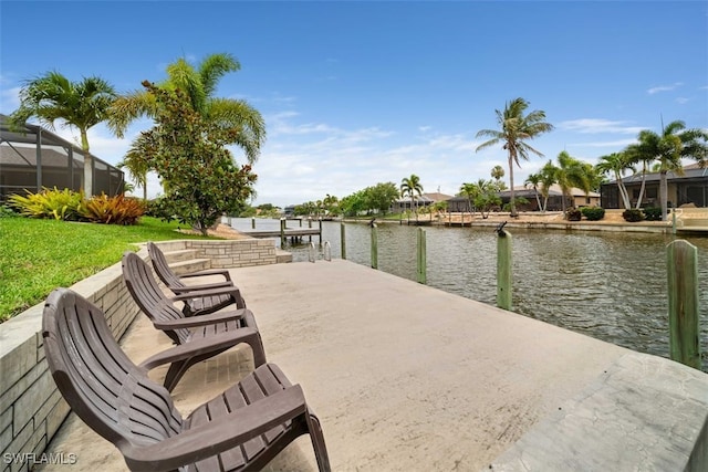 exterior space featuring a water view and a lanai