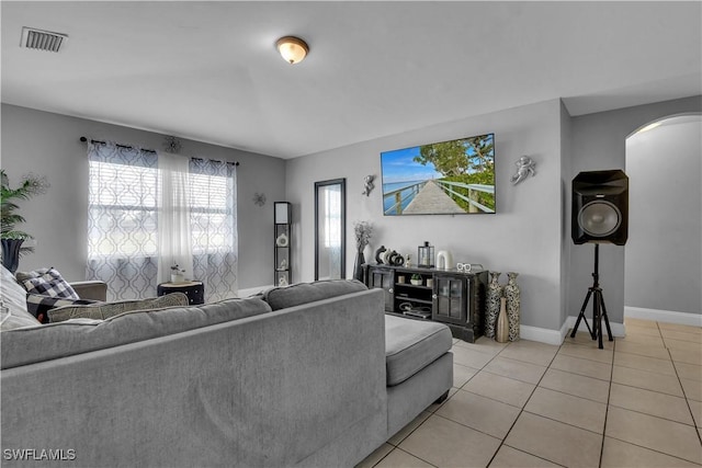 living room with light tile patterned floors