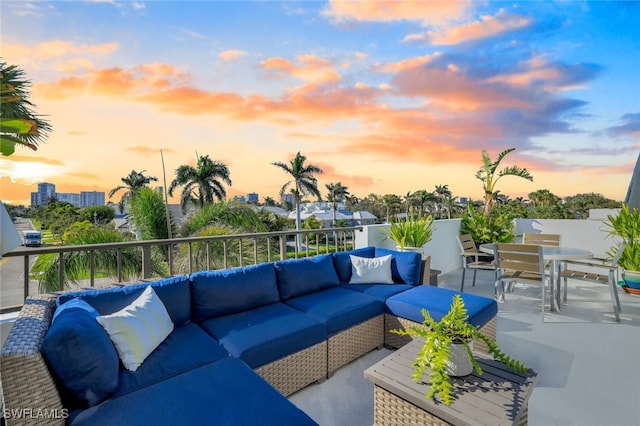 patio terrace at dusk with outdoor lounge area