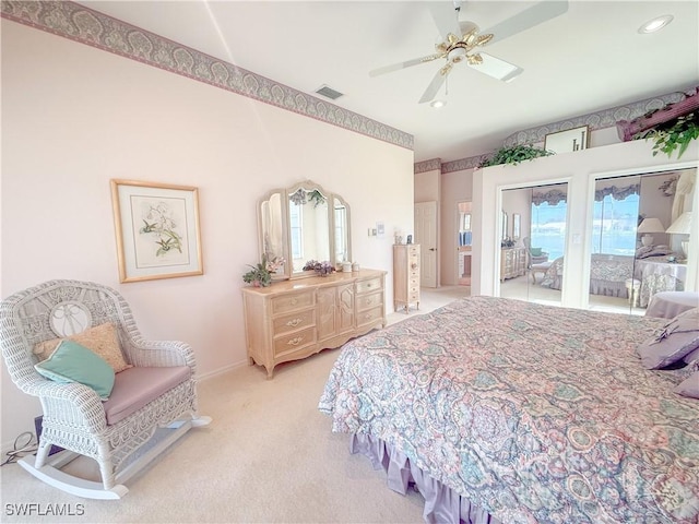 carpeted bedroom featuring access to exterior and ceiling fan