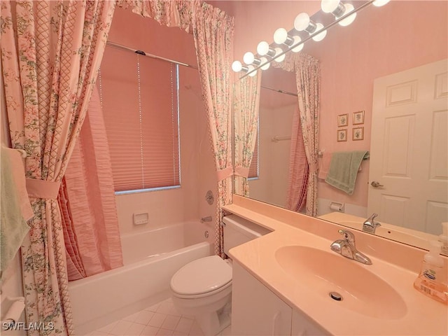 full bathroom featuring vanity, shower / tub combo, tile patterned floors, and toilet