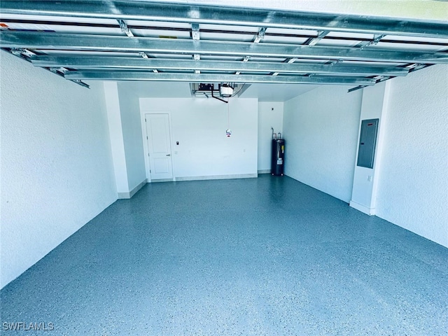 garage featuring water heater, electric panel, and a garage door opener