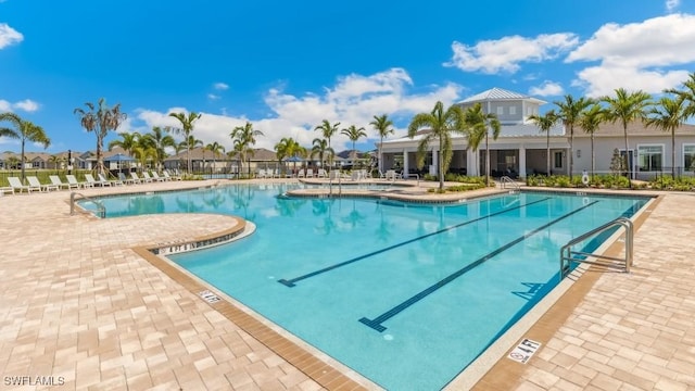 2609 Table Coral Trl, North Fort Myers, FL 33903 - community pool with a patio area