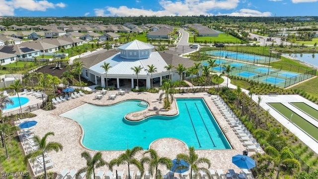2609 Table Coral Trl, North Fort Myers, FL 33903 - community pool with a residential view