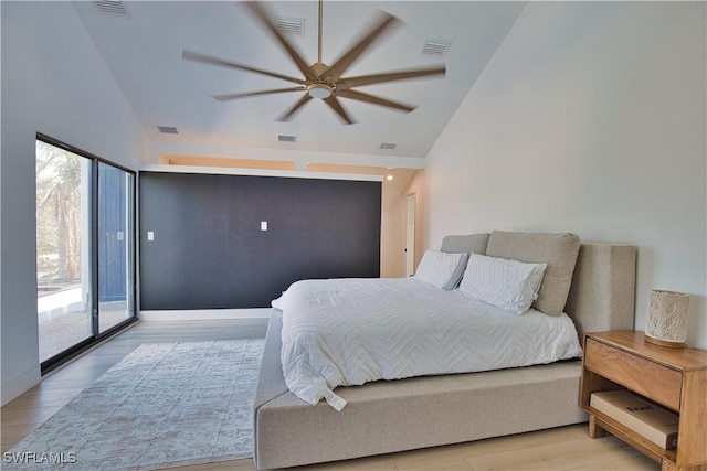 bedroom with ceiling fan, high vaulted ceiling, access to outside, and light hardwood / wood-style floors