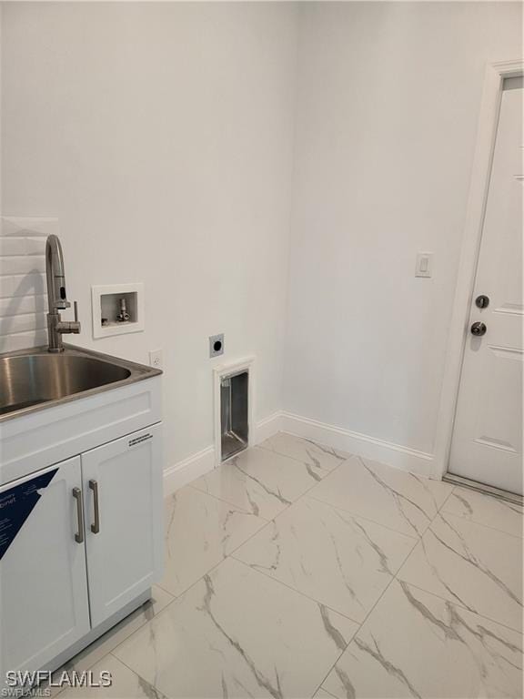 laundry room featuring cabinets, electric dryer hookup, sink, and washer hookup