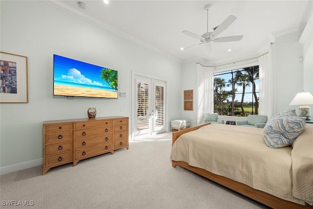 carpeted bedroom featuring crown molding, access to outside, ceiling fan, and french doors