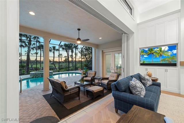 living room featuring ceiling fan