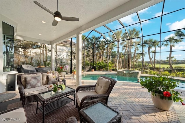 view of patio featuring ceiling fan, an outdoor living space, a lanai, and a pool with hot tub