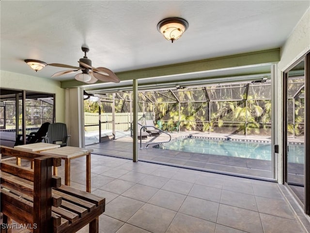 sunroom / solarium with ceiling fan