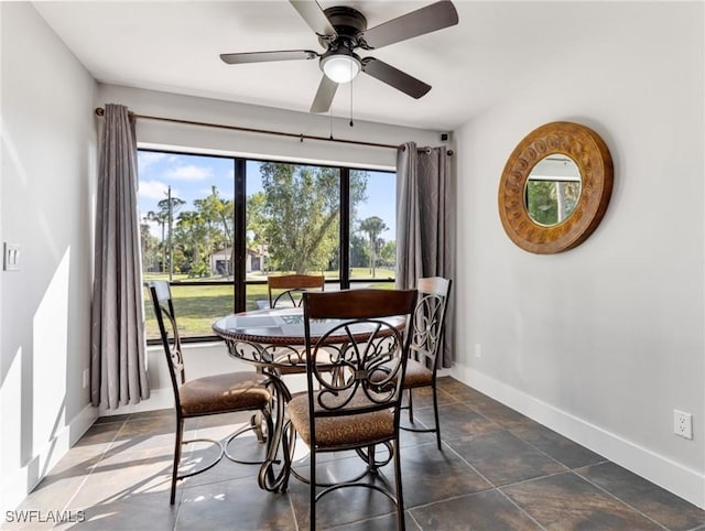 dining space with ceiling fan