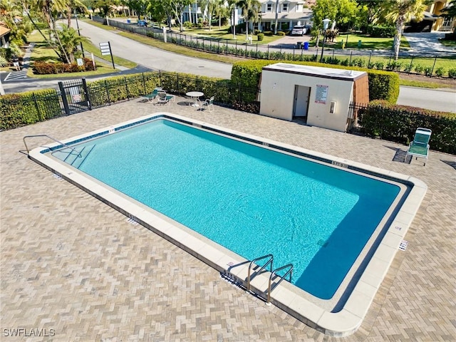 view of swimming pool featuring a patio area