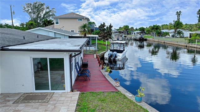 dock area with a water view