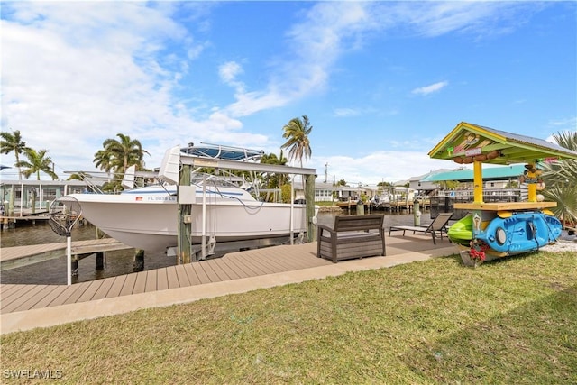 view of dock featuring a water view and a lawn